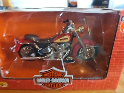  Maisto Harley-Davidson Motorcycles 1986 FLST HERITAGE SOFTTAIL EV Series 5 1:18 - Image 1 of 2