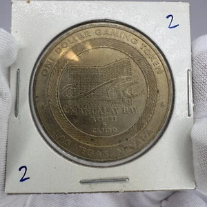 Vintage Mandalay Bay Resort & Casino $1 Gambling Token #2 - Picture 1 of 3