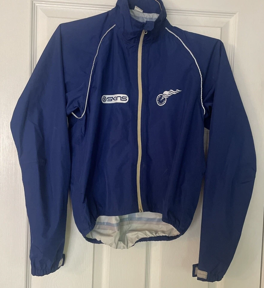 Chaqueta de Lluvia Skins USA Equipo de Ciclismo Unisex X-Pequeña XS Azul Real Impermeable Foto 1 de 4
