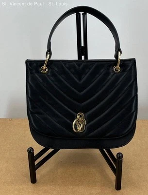 Cartera Gianni Bini negra acolchada de cuero sintético con asa superior herrajes dorados sin correa Foto 1 de 4