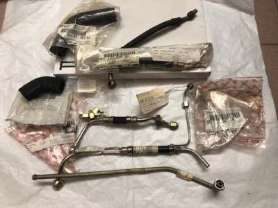 Porsche 911 930 Turbo oil lines & hardware lot OEM New not reproductions - Image 1 of 4