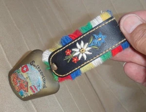 Swiss Vtg Dairy milk Cow Edelweiss Iron Bell Switzerland Memorabilia Souvenir - Picture 1 of 12