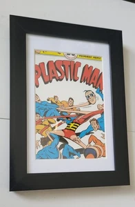 DC Comics Postkarte #67 GERAHMT Plastik Mann 11 gegen Schläger Ramona Fradon - Bild 1 von 5