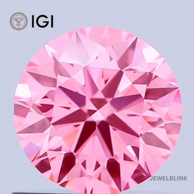 IGI Certified 0.72 Carat Fancy Vivid Pink VVS2 Round Cut CVD Lab Grown Diamond - Image 1 of 4