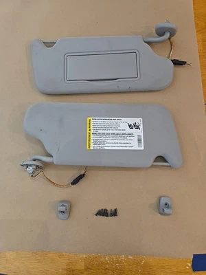 Chevrolet Impala D/S,P/S 2006-2013 parasoles tela gris con par de luces OEM Foto 1 de 4