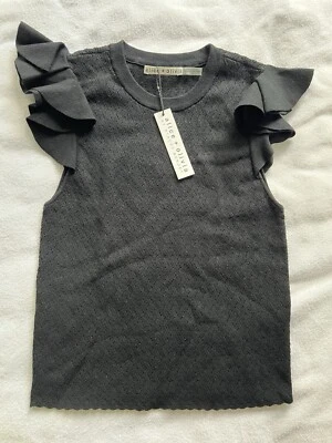 NUEVO CON ETIQUETAS $250 Alice & Olivia por Stacey Bendet Talla M Suéter Volantes Manga Gorra Negro Foto 1 de 3