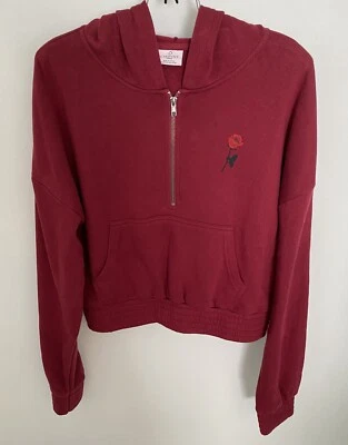 EMPYRE Junior Niñas L Rosa Serpiente Corta Sudadera con Capucha Arándano 1/2 Cremallera Bolsillo Canguro Foto 1 de 4