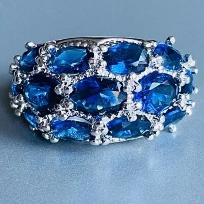 Simulated 3.85 CT Oval Cut Blue Sapphire Cluster Dome Wedding Ring In 935 Silver - Image 1 of 4