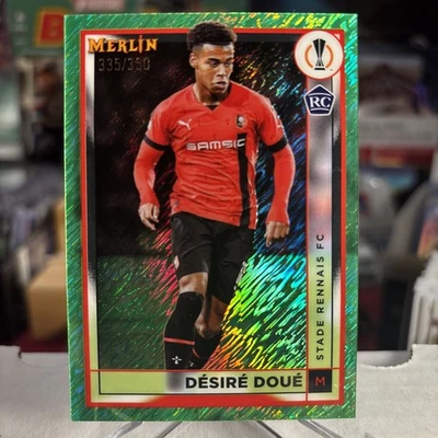 Desire Doue 2022-23 Topps Chrome Merlin UEFA UCL Neon Refractor RC SSP /350 - Image 1 of 3