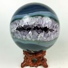 624g Polished agate sphere with crystal cluster center w/wood Stand Brazil A266