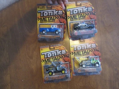 TONKA DIE CAST BODIES VINTAGE CARGO CARRIER , POLICE FORCE , UTILITY & TOW TRUCK - Image 1 of 4