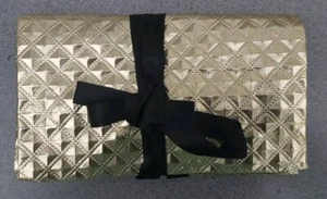 Borsa trucco fiocco nastro nero oro foderata zip testurizzata scomparti pieghevoli - Foto 1 di 14