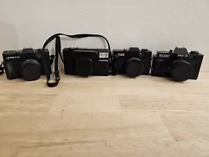 Lote de 4 cámaras vintage de 35 mm sin probar para repuestos o reparación - Imagen 1 de 9