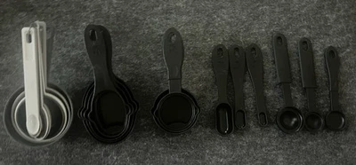 5 Sets Of Plastic Kitchen Measuring Spoons & Cups Black White & Gray - Image 1 of 3