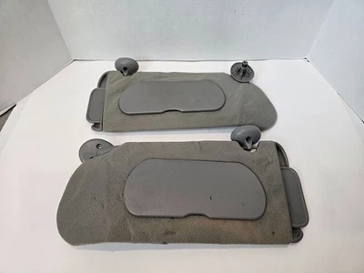 Par de parasoles Buick Lesabre 2000-2005 izquierda derecha gris con clips OEM P910 Foto 1 de 4