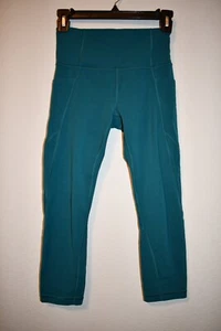 Athleta XS capri pants in teal color pockets on sides - Picture 1 of 5
