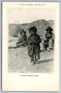 1907 YOUNG BRAVE NATIVE AMERICAN MINING TOWN RHYOLITE NEVADA postcard D11 - Picture 1 of 2