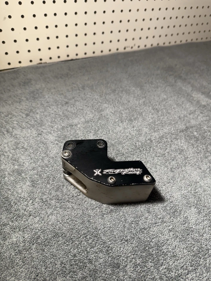 KLX 110 / DRZ 110 Two Brothers Racing Chain Guide Stock basculante Foto 1 de 4