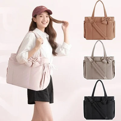 Bolso de hombro de yoga con acento de moño material de nailon bolsa de deporte para mujer Foto 1 de 4