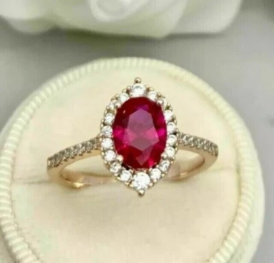 Anillo de compromiso con halo de rubí rosa simulado de corte ovalado de 2 quilates enchapado en oro amarillo de 14 quilates Foto 1 de 4