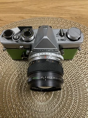 Olympus OM1 35mm SLR Film Camera with 3 Zuiko lenses - Image 1 of 4