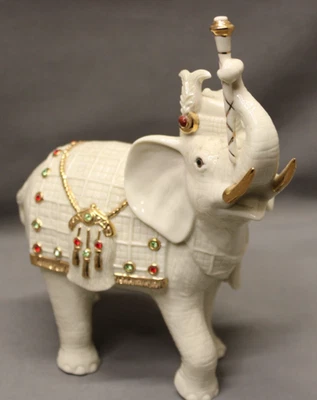 ESTATUITAS DE PORCELANA LENOX DE 7,5" ELEFANTES DE LAS TIERRAS ALTAS EN ESTADO DE MENTA Foto 1 de 4