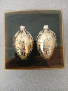 Celebrate Christmas with Treasured Glass Egg Shaped Holiday Ornaments - Picture 1 of 3