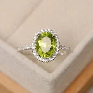 1.90 CT Oval Cut Lab-Created Green Peridot Engagement Ring 14K White Gold Plated - Picture 1 of 4