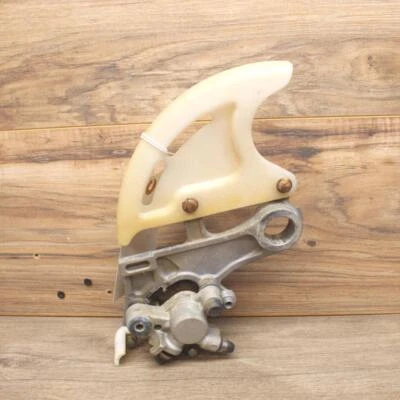 2005 Honda CRF250R REAR BACK BRAKE CALIPER W HANGER - Image 1 of 4