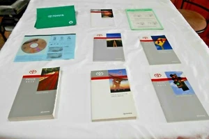 2012 TOYOTA PRIUS OWNER MANUAL 8 PC SET w/ NAV & GREEN TOYOTA FACTORY CASE. - Picture 1 of 6