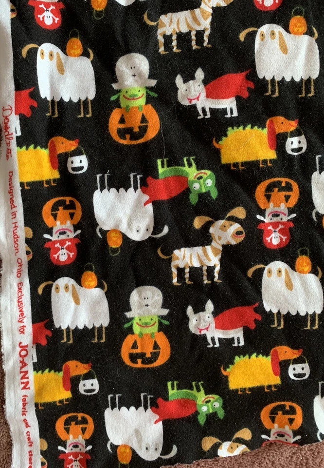 Halloween Dogs On Black Ground Joann Stretch Fabric 34” X 60” W - Image 1 of 3