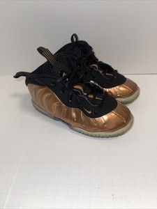 infant black and gold foamposites