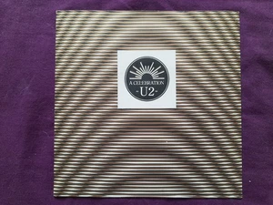U2:  A Celebration / Party Girl UK 7" inch single, 1982 Island WIP6770  EX / VG+ - Picture 1 of 9