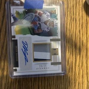 2023 Panini Impeccable rookie jersey and autographed Deuce Vaughn #15/25 - Picture 1 of 2