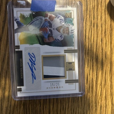2023 Panini Impeccable rookie jersey and autographed Deuce Vaughn #15/25 - Image 1 of 2