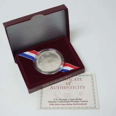 (1) 1995 D Olympic Games Blind Runner $1 MS/UNC Silver Dollar Coin w/ Box & COA - Image 1 of 2