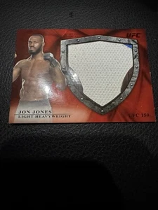Jon Jones /8 MAT RELIC FROM UFC 159 EVENT USED 2014 Topps UFC Bloodlines Rare - Picture 1 of 3