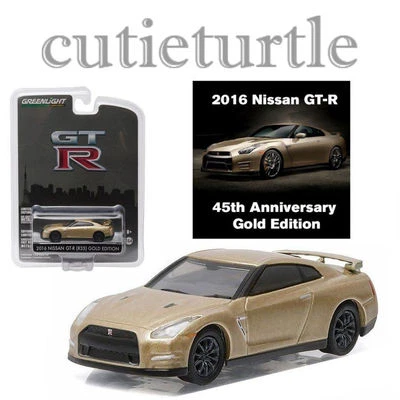 Nissan GT-R 2016 1:64 R35 45 aniversario colección 27850 F dorado Greenlight Foto 1 de 2