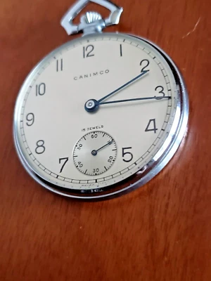 RELOJ BOLSILLO CAMICO NÍQUEL NUEVO STOCK ANTIGUO 1949 BIEN MANTENIDO Foto 1 de 4