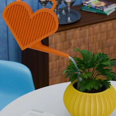 Lata de riego de plantas de corazón retro de mediados de siglo diseño minimalista moderno era espacial Foto 1 de 4