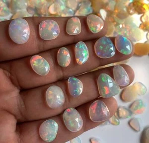 Einseitig geschliffenes Set AAA Klasse 10 Stück Scheibengröße äthiopischer Welo Feueropal für Ring - Bild 1 von 3