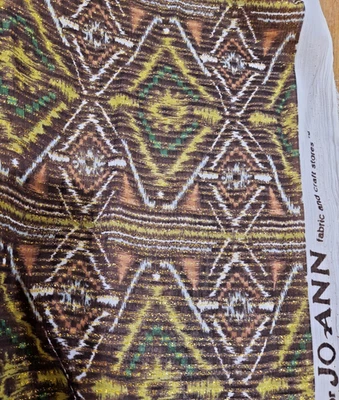 Tela Tiki transparente o africana con diamantes y rayas y brillo dorado JO-ANN 57" Foto 1 de 4