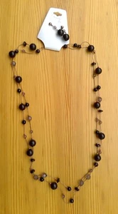 Set 2 pezzi perline nere collana/orecchini abbinati 2 livelli 16" metallo tono rame - Foto 1 di 7