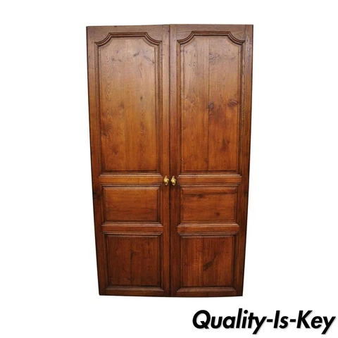 Pair of French Louis XVI Oak Interior Double Doors with Bronze Rococo Door Knobs Cover