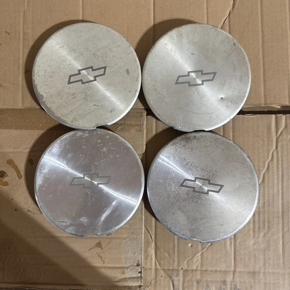 Juego de 4 tapas centrales de llantas de aleación Chevy Prism 1993-2002 usadas #42603-AB011 Foto 1 de 2