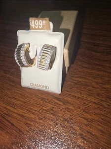 1/3 CT. T.W. Diamond Edge Ribbed Huggie Hoop Earrings in 10K Gold - Picture 1 of 4