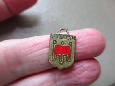 ANTIQUE VINTAGE GOLD TONE RED ENAMEL AUVERGNE TRAVEL SHIELD FOB CHARM PENDANT - Image 1 of 2