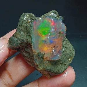 Natural 128.80 Carat - Rough Opal Stone with Vibrant Play-of-Color 42x30x21 mm - Picture 1 of 8