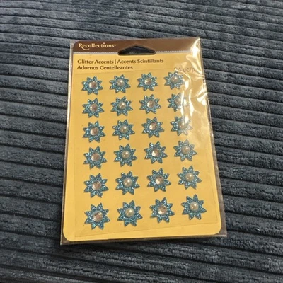 REPUESTOS FLORES DE PAPEL GLITTE AZUL/VERDE Y RECUERDOS Acentos de brillo azul Foto 1 de 2