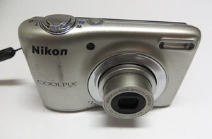 Nikon COOLPIX L25 10.1MP Silver Digital Camera 5x Zoom Cracked Screen Works - Picture 1 of 4